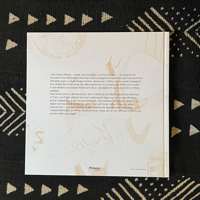 Afrika Malerei Sabine Waldmann-Brun – orangefarbenes Rückseiten-Detail des Kunstbuchs, Präsenz Verlag