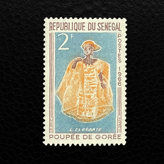 Timbre du Sénégal représentant une poupée de Gorée