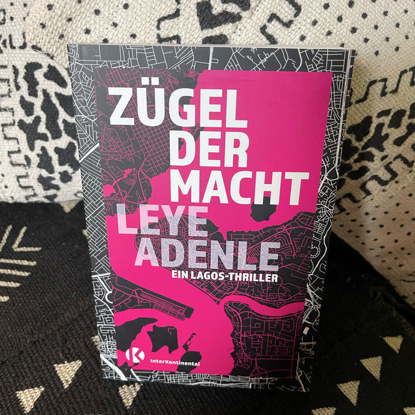Detailansicht Buchcover Zügel der Macht – pinkes Stadtplan-Motiv, Leye Adenle, InterKontinental Verlag